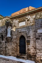 Church of the Holy Trinity, Knights Street in Old Town from the time of the Knights of St. John, only surviving 16th century street in late Gothic style, Oddos Ippoton, Rhodes Town, Greece, Europe