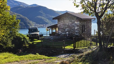 Rustico with lake view, parked Toyota Land Cruiser, Cannobio, Lago Maggiore, Verbano-Cusio-Ossola, Piedmont, Italy, Europe
