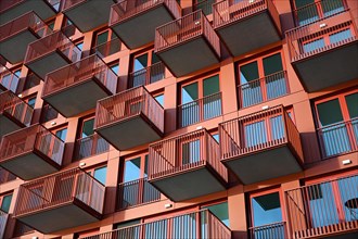 Orange facade with balconies, NDSM Plein, Amsterdam, Netherlands