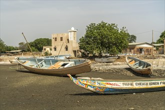Fishing boats and the mosque in Missirah, Sine Saloum Delta, Senegal, West Africa, Africa