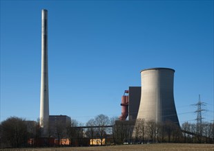 The Ibbenbueren hard coal-fired power plant with exhaust air stack and cooling tower. Ibbenbueren, North Rhine-Westphalia, Germany, Europe
