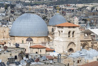The domes and bell tower of the Church of the Holy Sepulchre above the rooftops of the Old City, Jerusalem, Israel, Asia