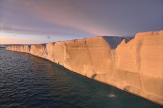 Brasvellbreen coastal glacier, glacier front in evening light at sunset, Nordaustlandet, Svalbard