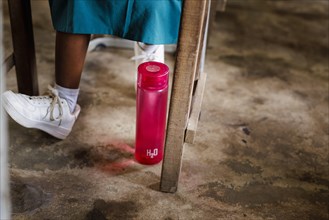 Subject: Schoolchildren in Africa with a water bottle, Krokrobite, Ghana, Africa