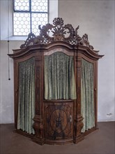 Confessional in the Catholic parish church of St. Peter and Paul, former collegiate church, Romanesque columned basilica, Unesco World Heritage Site, Niederzell on the island of Reichenau in Lake Cons...