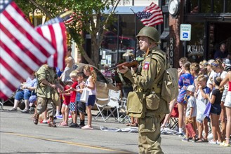 Hutchinson, Kansas, A soldier displays his weapon during the annual July 4 Patriots Parade in rural Kansas