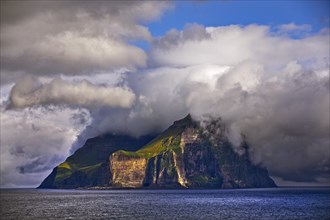 The island of Kalsoy in the North Atlantic with sun and clouds, Faroe Islands, Foroyar, Denmark, Europe