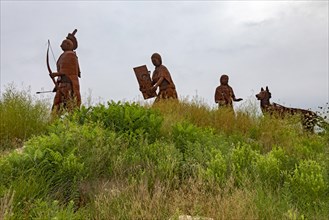 Cuba, Missouri, The Osage Trail Legacy Monument shows an Osage Indian family moving west on the Osage Trail, which is now Interstate 44. The Native American Osage tribe dominated much of what is now, ...