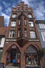 Brick residential and commercial building built 1900, Lueneburg, Lower Saxony, Germany, Europe