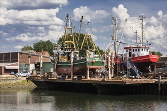Seaside resort Buesum, at the fishing harbour with shipyard and repairs on the crab cutter, Buesum, Schleswig-Holstein, Germany, Europe
