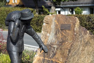 The Smuggler, this monument commemorates the time of coffee smuggling from 1945-1953 at the German-Belgian border, North Eifel, Monschau, North Rhine-Westphalia, North Rhine-Westphalia, Germany, Europ...