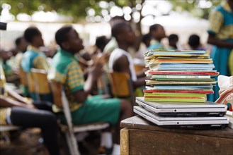 Topic: School children in Africa. Stack of notebooks and books, Krokrobite, Ghana, Africa