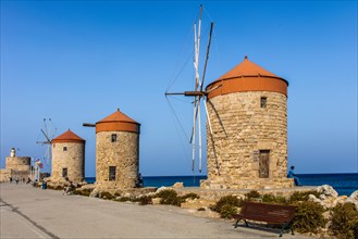 Three windmills on the pier, Mandraki Harbour, Rhodes Town, Greece, Europe