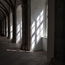 Incidence of light through window in cloister, Corvey Castle World Heritage Site, interior photograph, Hoexter, Weserbergland, North Rhine-Westphalia, Germany, Europe
