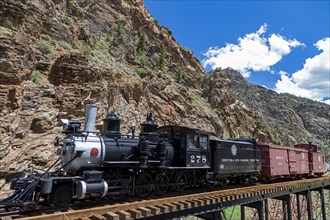 Cimmaron, Colorado, The Denver & Rio Grande Railroad is displayed on the last remaining trestle of the railroads historic route along the Black Canyon of the Gunnison. The railroad operated from 1882 ...