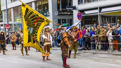 Procession, entry of the Wiesnwirte, flag bearers in Landsknecht uniforms, Oktoberfest, Munich, Upper Bavaria, Bavaria, Germany, Europe