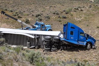 Diamondville, Wyoming, A semi-trailer truck that drove off U.S. Highway 30 and crashed in southwestern Wyoming