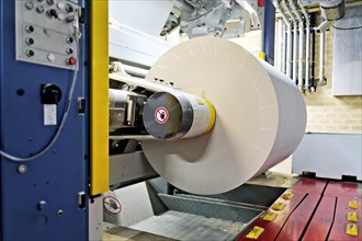 Large-scale printing plant: Paper feed to the web offset press. Stuttgart, Baden-Wuerttemberg, Germany, Europe