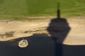 Shadows of the Rhine Tower on the banks of the Rhine seen from above, Duesseldorf, North Rhine-Westphalia, Germany, Europe