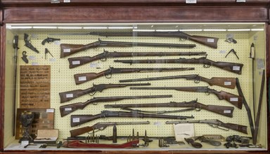 Kinsley, Kansas, The Edwards County Historical Society Museum, A selection of rifles and other firearms is on display