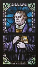 Portrait of Luther, stained glass in the Protestant Jakobuskirche, the only late Gothic basilica in Westphalia, Breckerfeld, Germany, Europe