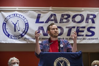 Chicago, Illinois, Jon Schleuss. president of the NewsGuild, speaks during the 2022 Labor Notes conference
