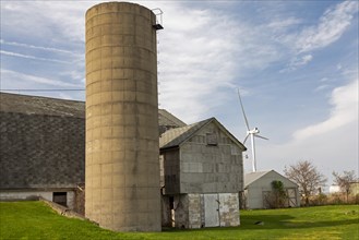 Pigeon, Michigan, A wind turbine, part of the Harvest II Wind Project, near a barn in the Thumb of Michigan