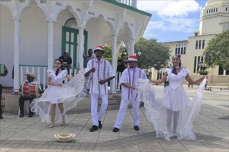 Local dance group for tourists, in the Parque Independenzia in the Centro Historico, Old Town of Puerto Plata, Dominican Republic, Caribbean, Central America