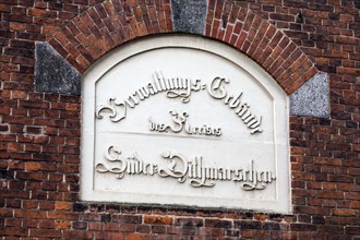 An old inscription on the Meldorf district court, administrative building of the district of Suederdithmarschen, Meldorf, Schleswig-Holstein, Germany, Europe