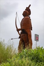 Cuba, Missouri, The Osage Trail Legacy Monument shows an Osage Indian warrior moving west on the Osage Trail, which is now Interstate 44. The Native American Osage tribe dominated much of what is now,...