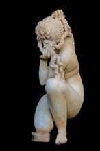 Small marble statue of Crouching Aphrodite from the Bath, known as Venus of Rhodes, 100 BC, Archaeological Museum in the former Order Hospital of the Knights of St John, 15th century, Old Town, Rhodes...