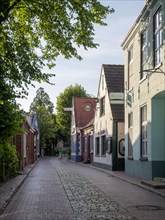 Lane in Greetsiel, Krummhoern, East Frisia, Lower Saxony, Germany, Europe