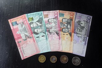 Dominican pesos in notes and coins, Dominican Republic, Caribbean, Central America