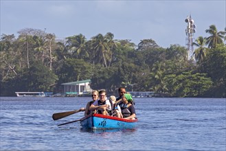 Tortuguero, Costa Rica, Tourists in a small boat near Tortuguero National Park, Central America