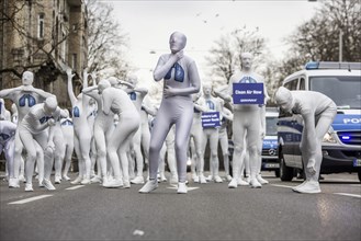Protest of the environmental organisation Greenpeace, on the Bundesstrasse 14 40 activists demand better air quality, the Neckartor is considered the most polluted street in Germany with high levels o...
