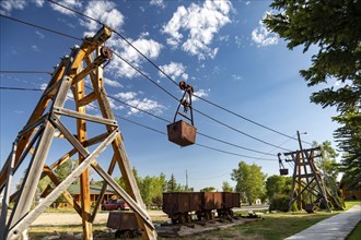 Encampment, Wyoming, The Grand Encampment Museum highlights the mining, ranching, and logging history of the town. A 16-mile aerial tramway, the longest in the world, was built in 1902 to carry ore fr...