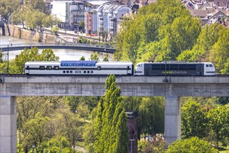 Individual rail journey with the Luxon special train from railadventure, here travelling over a railway bridge in Bad Cannstatt, Stuttgart, Baden-Wuerttemberg, Germany, Europe
