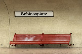 Empty bus stop Schlossplatz with red bench, Stuttgart, Baden-Wuerttemberg, Germany, Europe