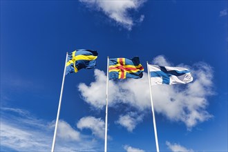Three flags side by side, Sweden, Aland, Finland, sunny weather, Eckeroe, Fasta Aland, Aland Islands, Aland Islands, Finland, Europe