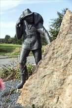 The Smuggler, this monument commemorates the time of coffee smuggling from 1945-1953 at the German-Belgian border, North Eifel, Monschau, North Rhine-Westphalia, North Rhine-Westphalia, Germany, Europ...