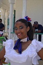 Portrait of a dancer of the local dance group with musicians for tourists, in the Parque Independenzia in the Centro Historico, old town of Puerto Plata, Dominican Republic, Caribbean, Central America