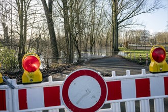Flooding of the Rhine in the Urdenbacher Kaempe, nature reserve, alluvial soil, road closed due to flooding, Duesseldorf, North Rhine-Westphalia, Germany, Europe