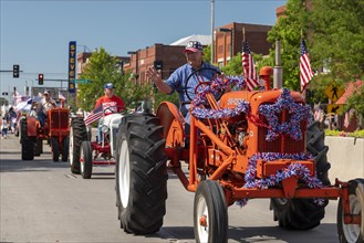Hutchinson, Kansas, Tractors join the annual July 4 Patriots Parade in rural Kansas