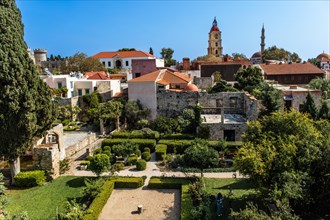 View of clock tower with gardens in front, Roloi, 7th century, Rhodes Town, Greece, Europe