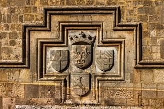 Coat of arms on the French hostelKnights Street in Old Town from the time of the Order of St. John, the only surviving 16th century street in the late Gothic style, Oddos Ippoton, Rhodes Town, Greece,...