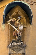 Sculpture of St. Michael the Archangel fighting the devil