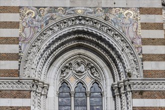 Detail with mosaics of the facade of the Capuchin Church of Our Lady of Lourdes