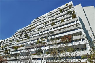 High-rise building with green balconies in the former Olympic Village