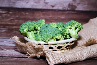 Small cut broccoli isolated on white background and copy space