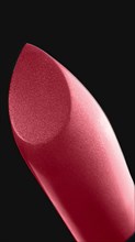 Close-up of lipstick on black background